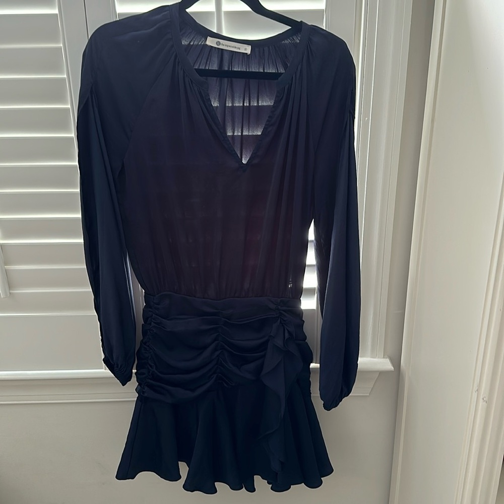 Navy blue impeccable pig dress with cinched waist and cut out sleeves. Size s
